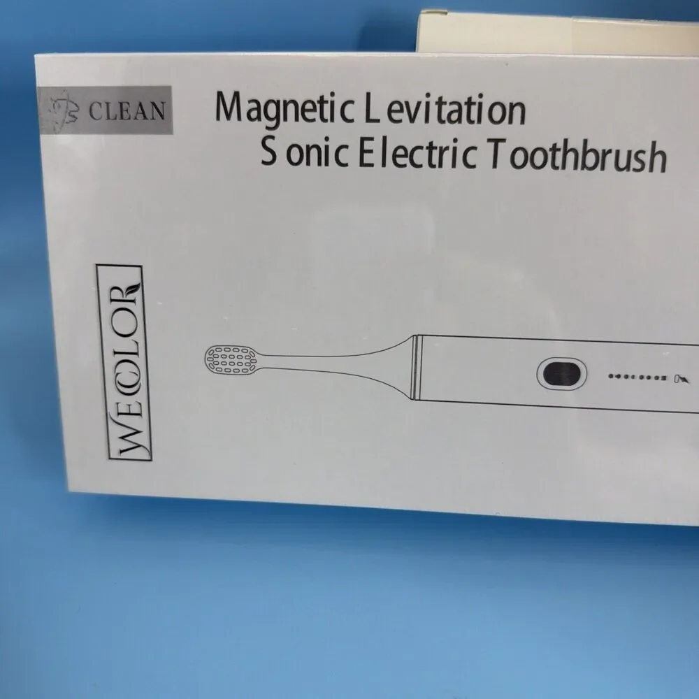 Wecolor Sonic Electric Toothbrush with 4 Replacement Heads. Color Green